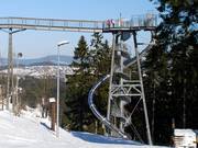 Panorama Erlebnisbrücke mit Rutsche – bei gutem Wetter auch im Winter geöffnet