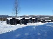 Ferienhäuser am Pistenrand