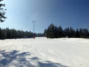 Breite und flache Abfahrt im oberen Teil