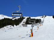 Hochalm 6er - 6er Hochgeschwindigkeits-Sesselbahn (kuppelbar) mit Abdeckhauben und Sitzheizung