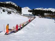 Sunny II - Förderband/Zauberteppich