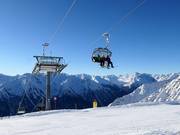 Sesselbahn Alblittkopfbahn mit Wetterschutzhauben