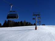 Monte Piz - Ikarus - 4er Hochgeschwindigkeits-Sesselbahn (kuppelbar) mit Abdeckhauben