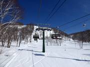 Jumbo Quad Lift #1 - 4er Hochgeschwindigkeits-Sesselbahn (kuppelbar) mit Abdeckhauben